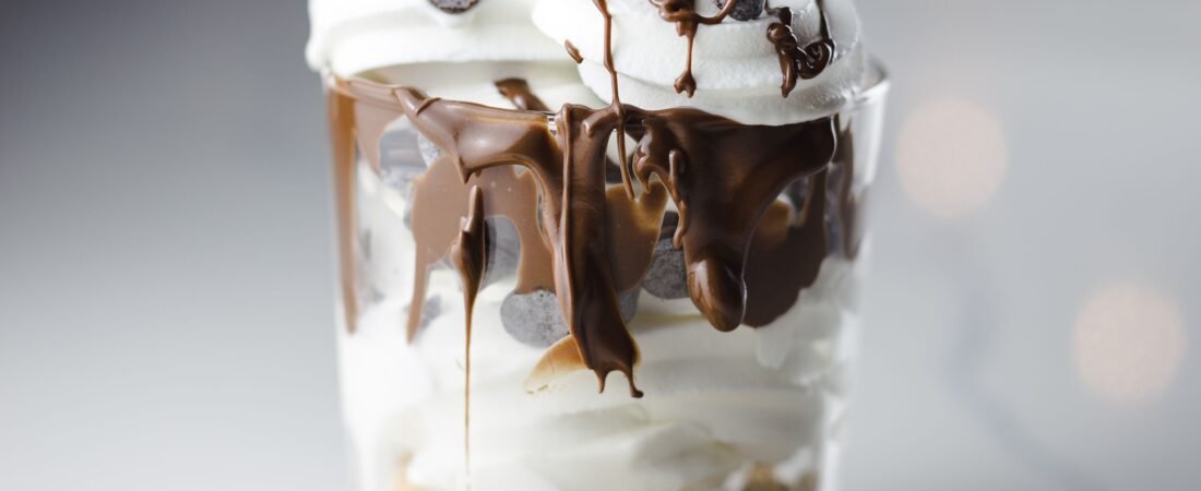 Chocolate Granola Parfait with Whipped Cream and Chocolate Chips