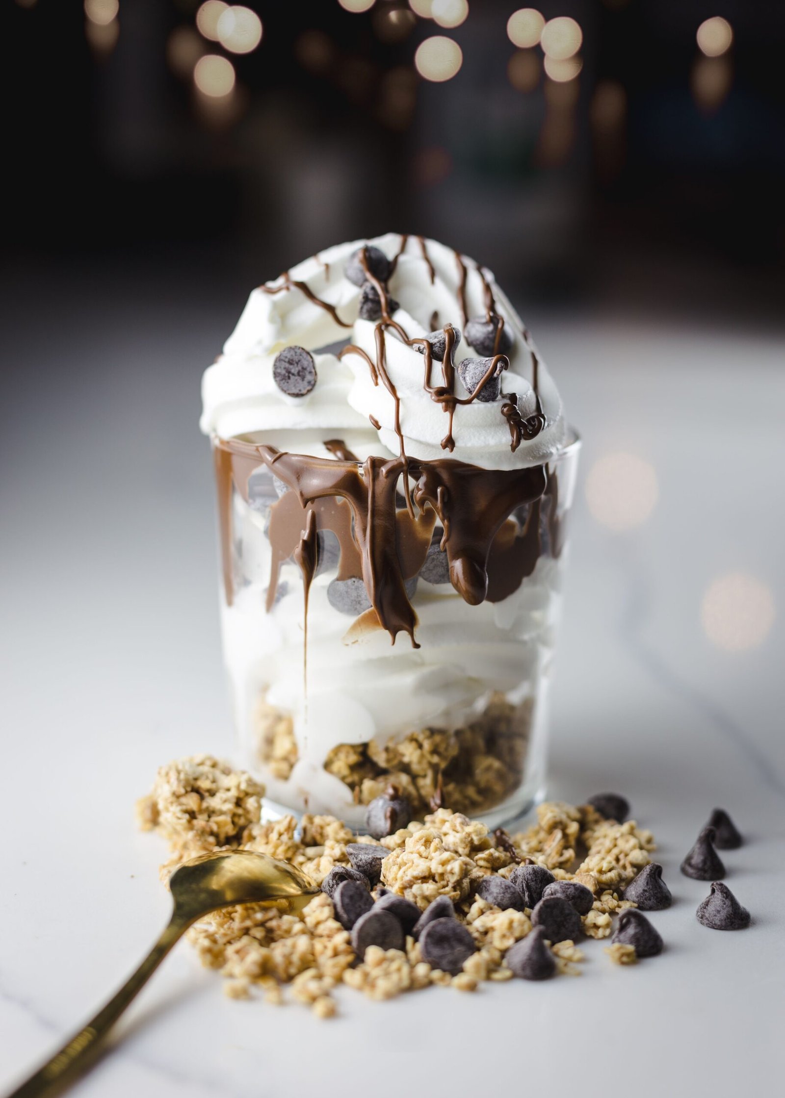 Chocolate Granola Parfait with Whipped Cream and Chocolate Chips