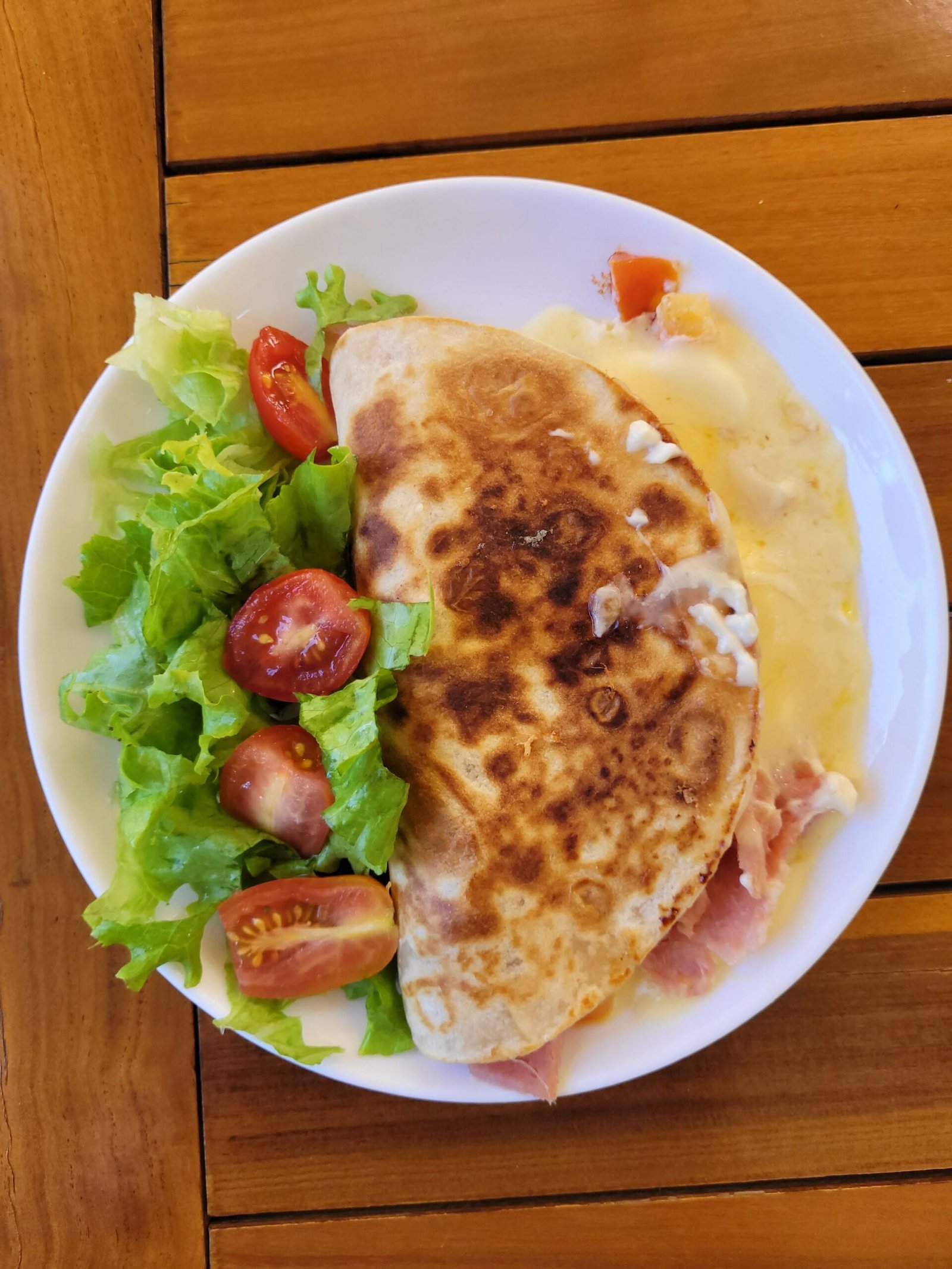 Ham and Cheese Stuffed Flatbread with Melted Cheese and Fresh Side Salad
