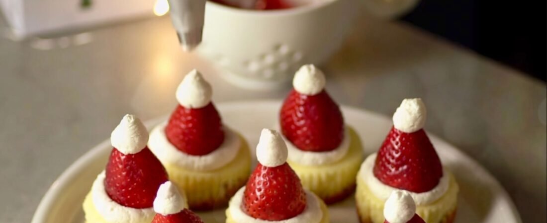 Santa Hat Mini Cheesecakes with Strawberries and Whipped Cream