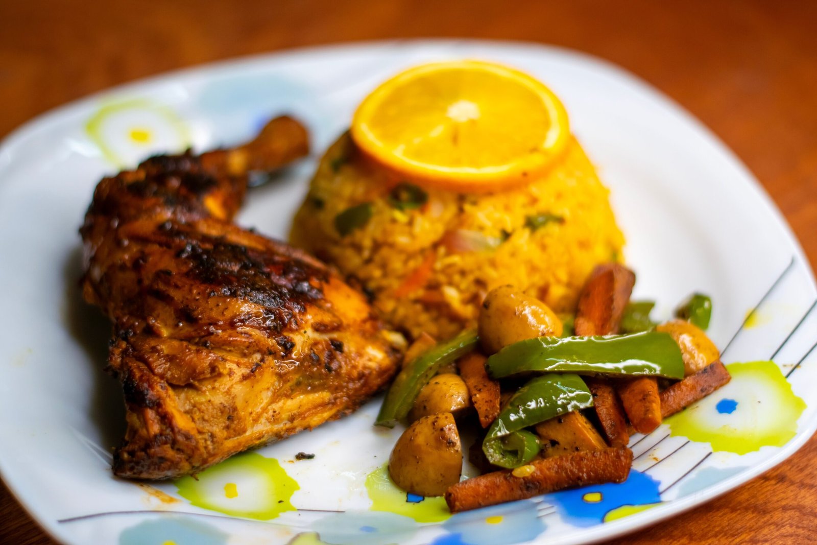 Grilled Chicken Quarter with Golden Saffron Rice and Sautéed Vegetables